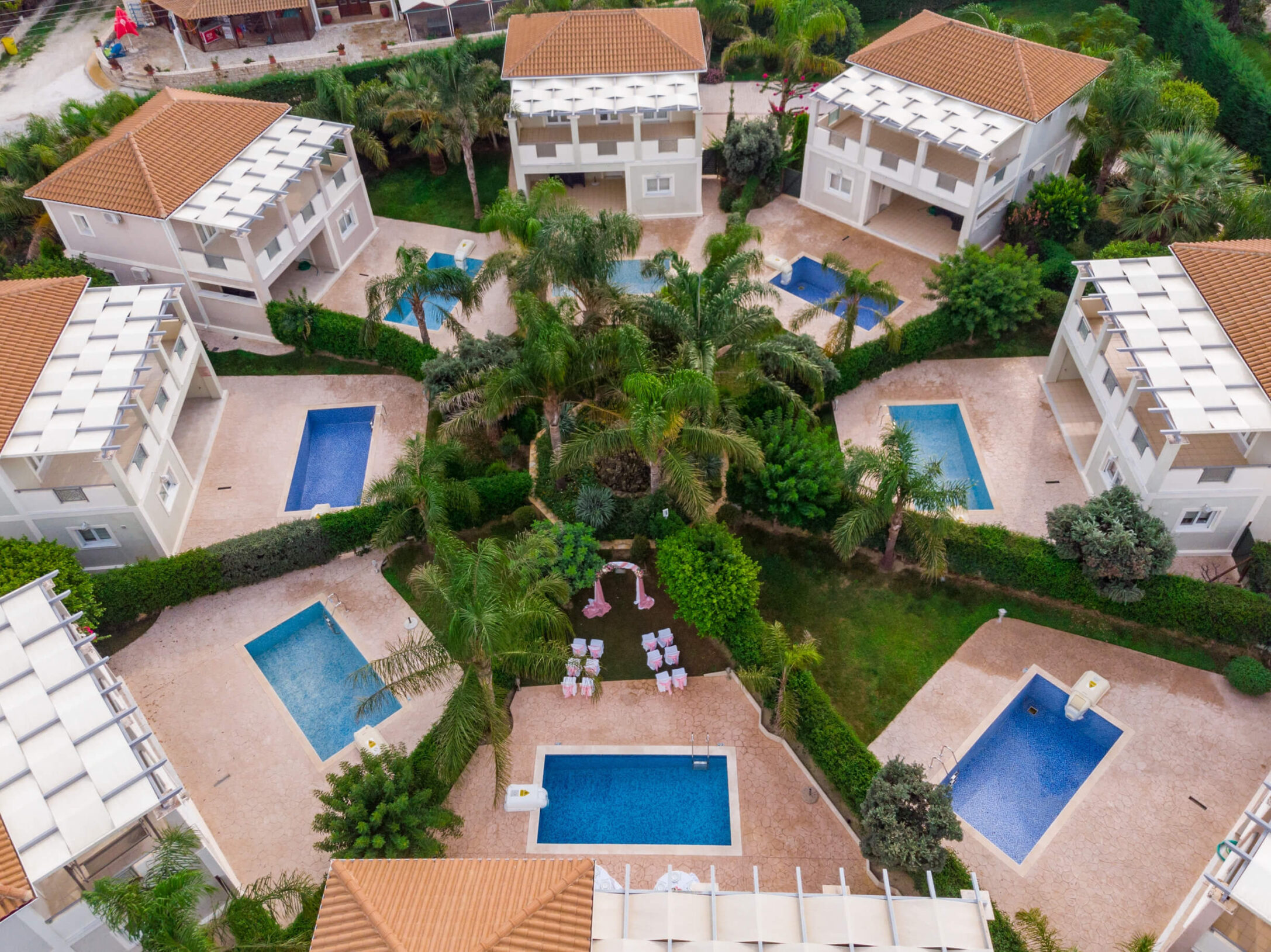 Aerial View of the 8 villas, at Mamfredas Resort
