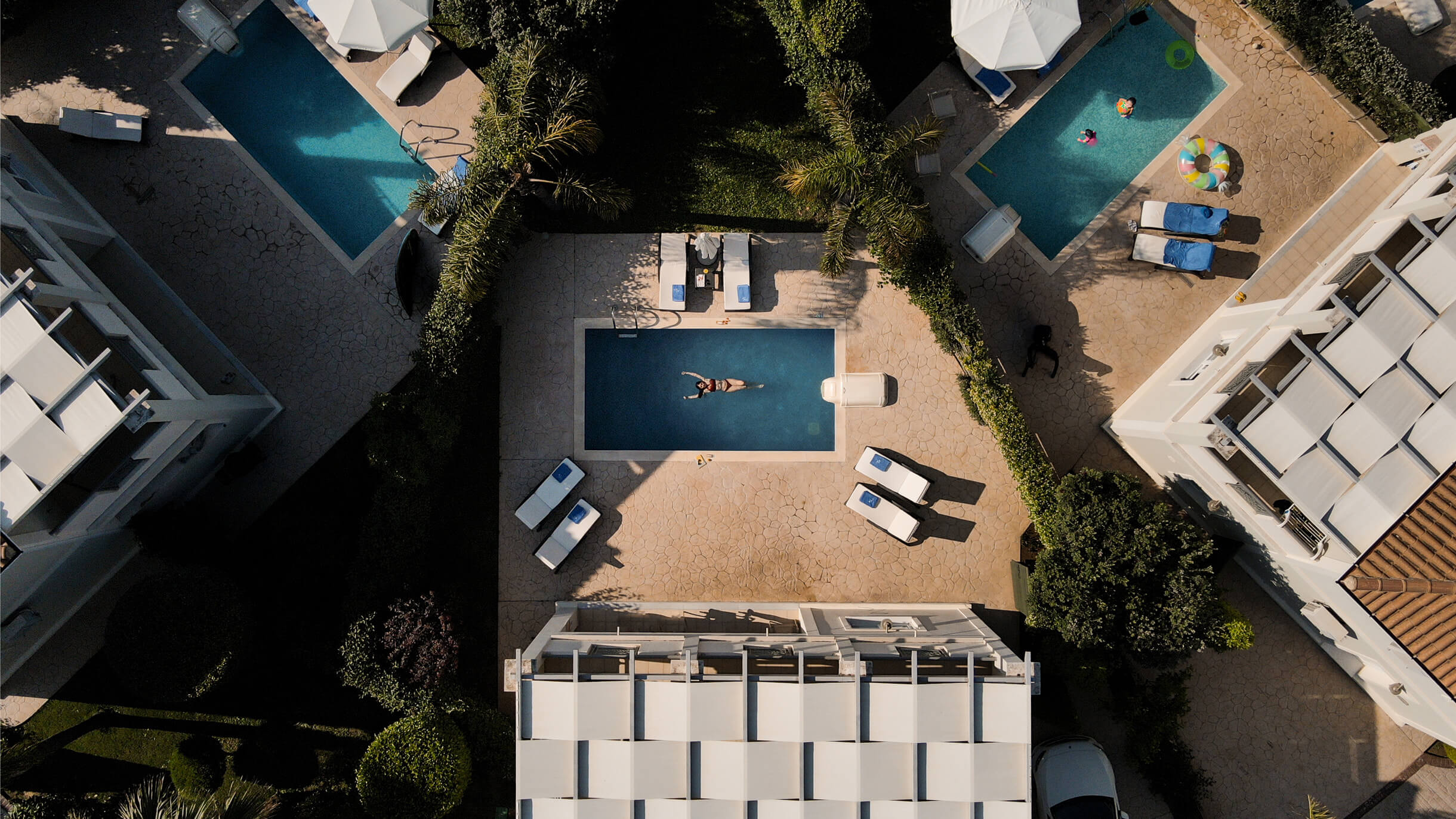 a drone photo of the villa's pool